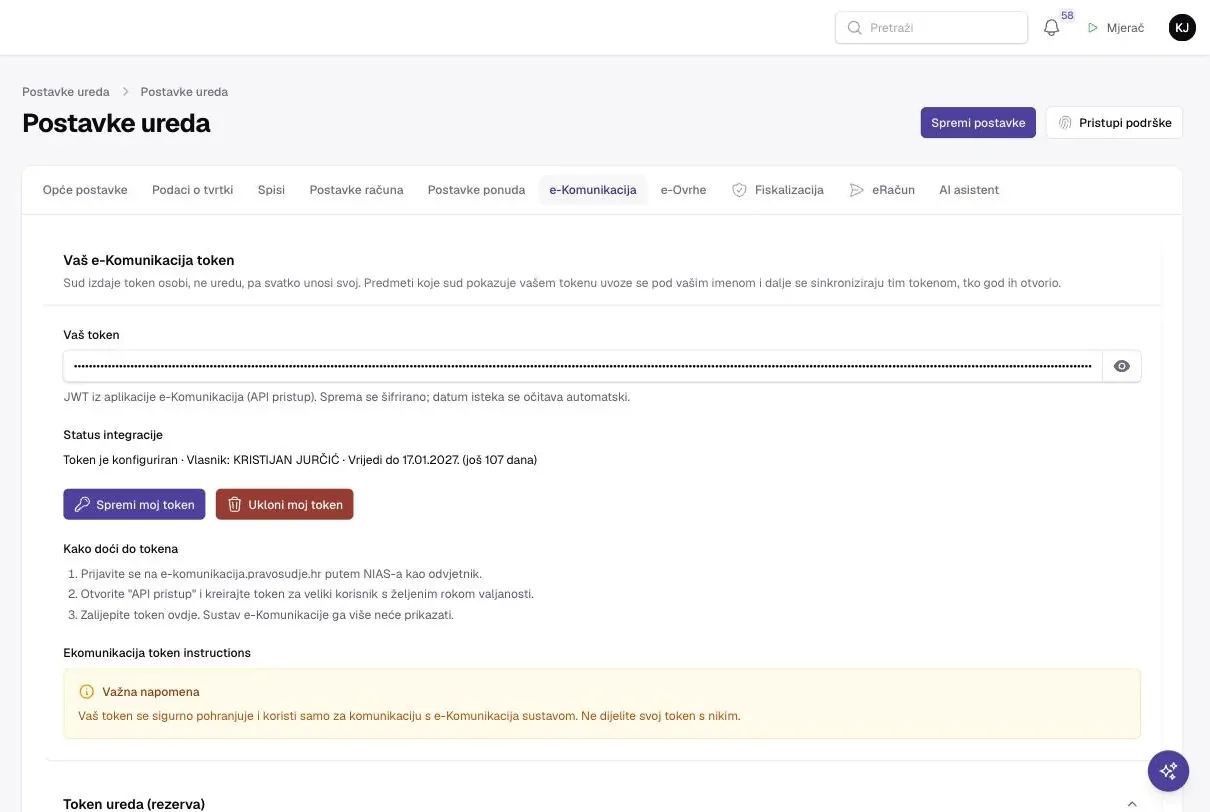 Postavke ureda, kartica e-Komunikacija: sekcija Vaš e-Komunikacija token s maskiranim poljem Vaš token, Status integracije (token konfiguriran, vlasnik, vrijedi do datuma), gumbi Spremi moj token i Ukloni moj token, upute Kako doći do tokena i napomena o sigurnosti; ispod sekcija Token ureda (rezerva).